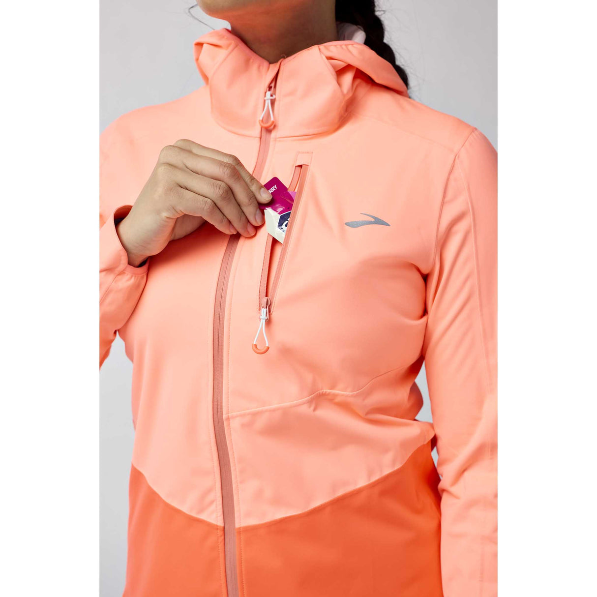 Brooks High Point 2 manteau imperméable de course à pied femme face - Neo Ember / Flame