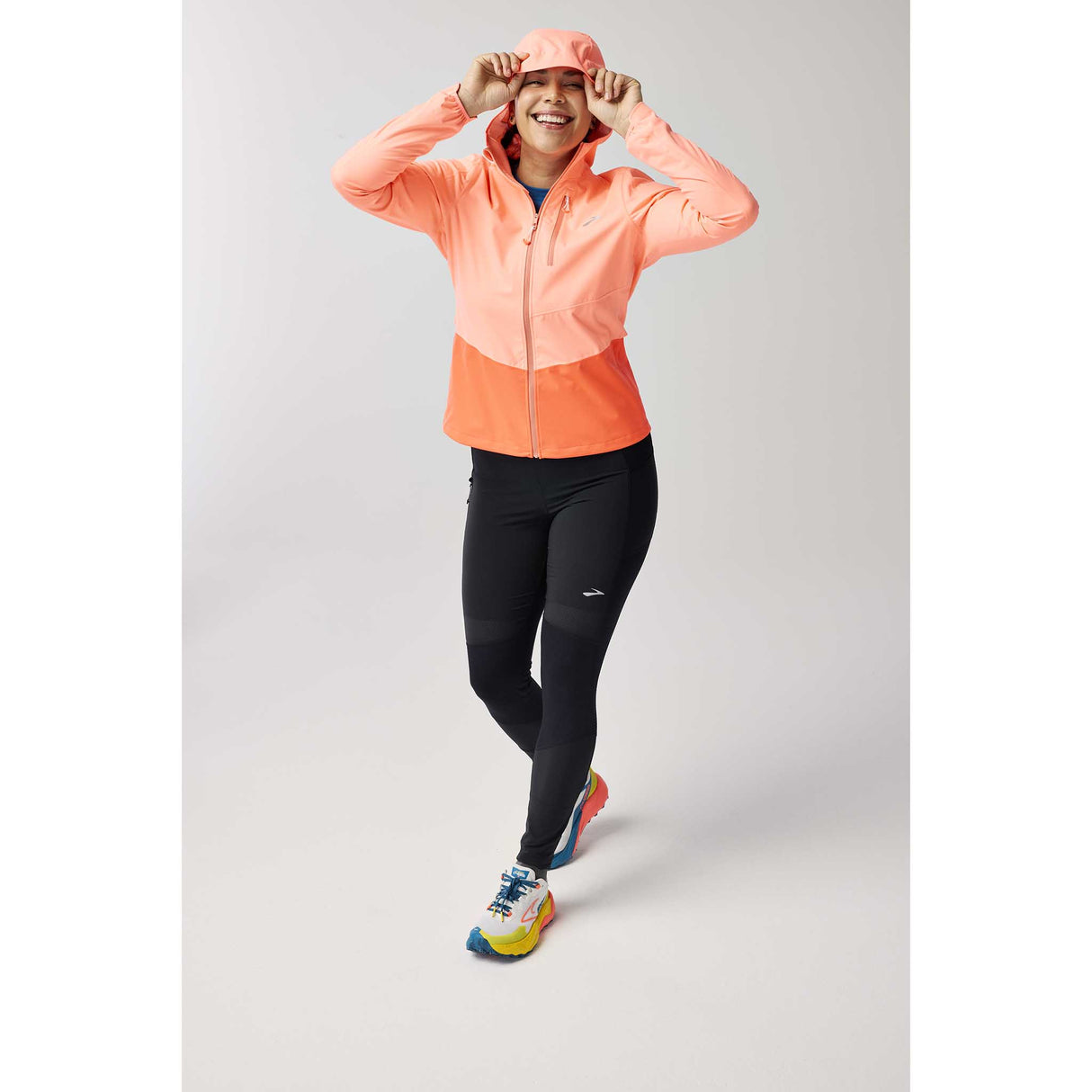 Brooks High Point 2 manteau imperméable de course à pied femme live- Neo Ember / Flame