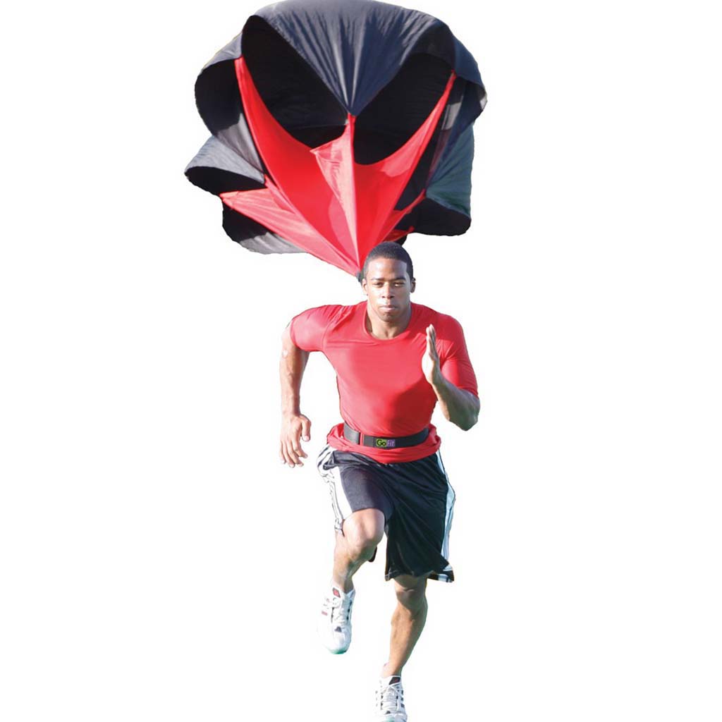 Junior Football Player Running with Parachute. Soccer Endurance